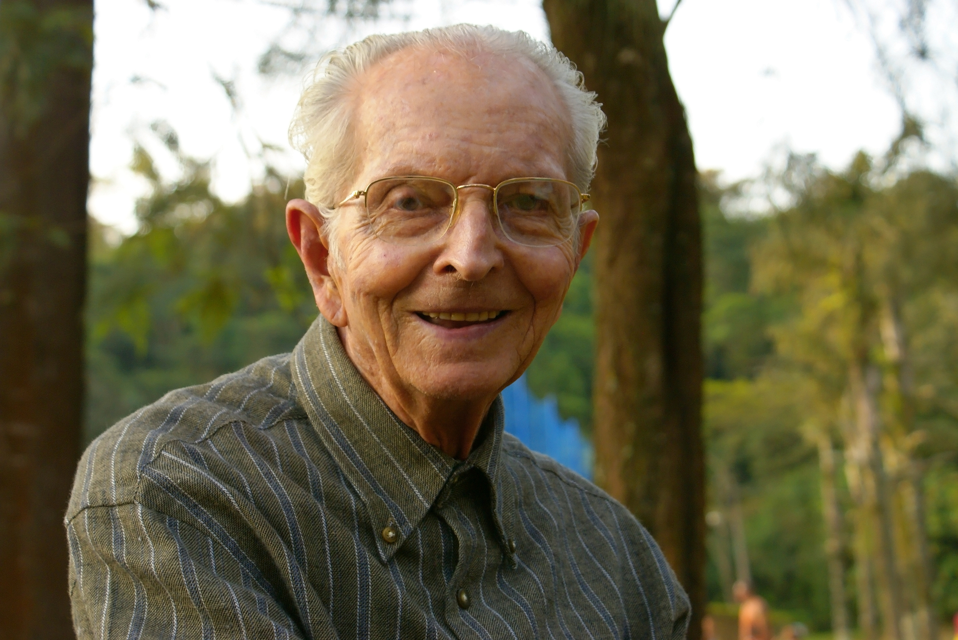 Client with Parkinson's receiving support